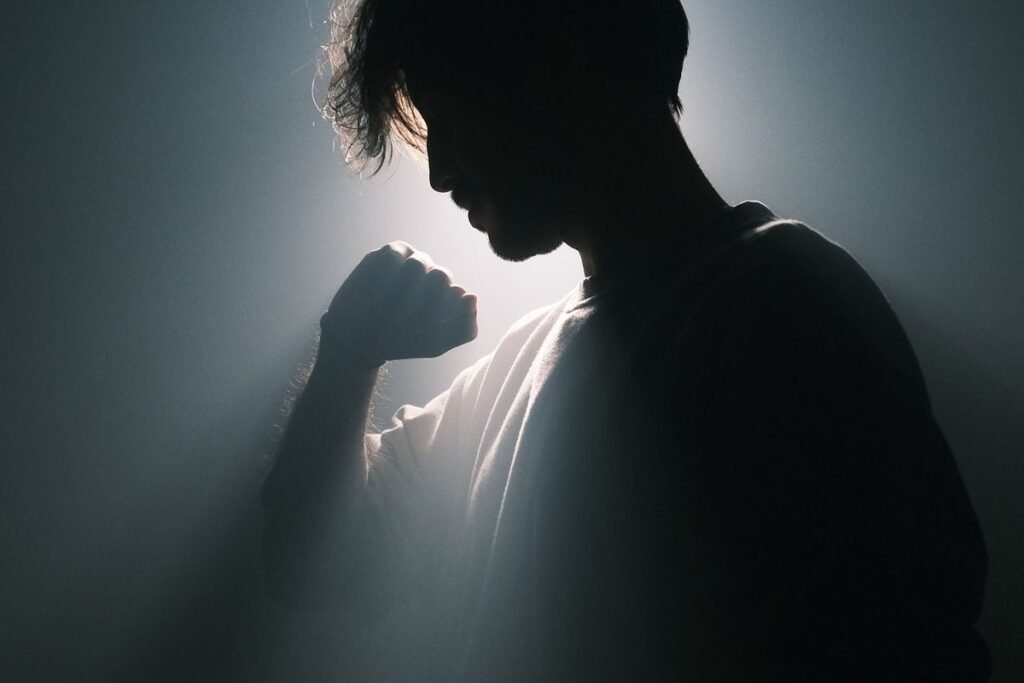 Silhouette of a person in contemplative reflection, symbolizing self-understanding through astrology